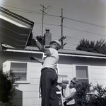 Residents of 7 Lakes Neighborhood Work on Home for MBC Advertising, A by George Skip Gandy IV