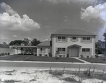 Yellow House with Carport for Mar-Lyn Homes, B by George Skip Gandy IV