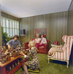 People Sitting in Living Room at Mariners Pass in St. Petersburg, A by George Skip Gandy IV