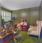People Sitting in Living Room at Mariners Pass in St. Petersburg, B by George Skip Gandy IV