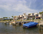 Boats Docked in Hillsborough River Behind Marina Club Condominiums in Tampa, B by George Skip Gandy IV
