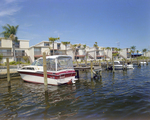 Boats Docked in Hillsborough River Behind Marina Club Condominiums in Tampa, E by George Skip Gandy IV