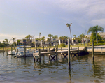 Boats Docked in Hillsborough River Behind Marina Club Condominiums in Tampa, F by George Skip Gandy IV