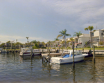 Boats Docked in Hillsborough River Behind Marina Club Condominiums in Tampa, H by George Skip Gandy IV