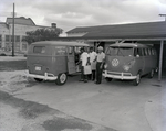 Men Loading Matheny Caterers Vehicles for Howell Motors by George Skip Gandy IV