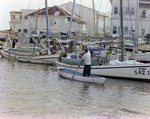 Children and Boats on Water in Belize, B by George Skip Gandy IV