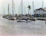 Children and Boats on Water in Belize, D by George Skip Gandy IV
