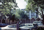 Man standing in parking lot of Gordon Keller School of Nursing