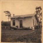 Home at 3006 Waverly Ave, Tampa with Helen Walker out front by Unknown