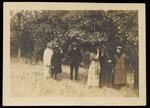 Lue Gim Gong and Visitors Picking Oranges from the Tree