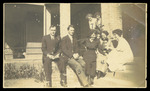 Group of Men and Women on Steps of Building