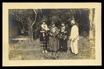 Lue Gim Gong and Group of Women Holding Oranges