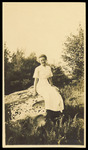 Woman Posing on Rock by Unknown