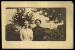 Postcard, Two Women in Front of Fence by Unknown