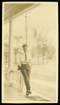 Young man Leaning against Railing by Unknown