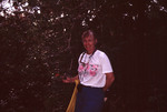 Nancy Ogden with Wild Mimosa Flower on Cochino Pequeño in Cayos Cochinos, Honduras