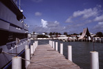 Wave Dancer Docked at Fort George Hotel and Spa in Belize City, Belize, A by John C. Ogden and Nancy B. Ogden