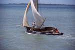 Two Men Maneuver Small Boat Called Sanbia in Belize, B by John C. Ogden and Nancy B. Ogden