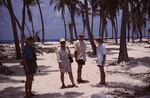 Four Divers Stand Together in Sand on Turneffe Atoll, Belize, May 16, 1999 by John C. Ogden and Nancy B. Ogden