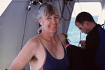 Woman Smiles at Camera Before Dive, Turneffe Atoll, Belize by John C. Ogden and Nancy B. Ogden