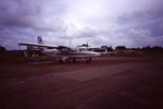 Airplane at Dangriga Airport in Dangriga, Belize by John C. Ogden