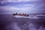 Boat of Researchers in Transit to South Water Caye, Belize by John C. Ogden