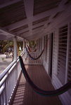 Hammocks on Balcony of Convent in South Water Caye, Belize by John C. Ogden