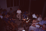 Researchers Sit Chatting at Pelican Beach Resort in Dangriga, Belize by John C. Ogden