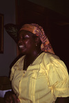 Woman Sings During Performance at Pelican Beach Resort in Dangriga, Belize by John C. Ogden