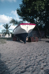 Boat Ashore by Road Bay in Sandy Ground, Anguilla by John C. Ogden