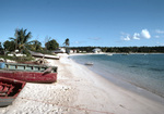 Boats Sit on Beach on Road Bay in Sandy Ground, Anguilla by John C. Ogden