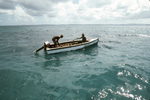 Two Men Fish for Lobsters on Road Bay in Anguilla by John C. Ogden