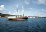 Ship Sails by Shore of Anguilla by John C. Ogden