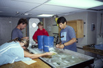 Researchers Work in Laboratory, Florida Keys by John C. Ogden