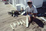 Researcher with Coral Specimens, Florida Keys by John C. Ogden