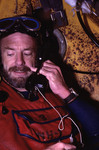 John Ogden using a phone inside Hydrolab, St. Croix