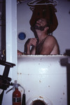 John Ogden shaving facial hair inside Hydrolab, St. Croix