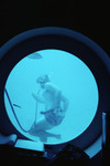 Diver looking into the window of Hydrolab [3] by John C. Ogden