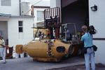 Small submarine being moved with a forklift