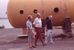 Rick Rounds, Senator Weicker, and Elliot Finkle standing in front of the "Aegir" underwater habitat