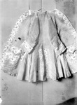 A Daisy rose frockcoat with heavy embroidery on the sleeves and pocket