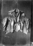 A Silk embroidered woman's bodice and three jackets (unidentified)