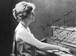 Marion Rous playing the piano. Inscribed To Miss Frances Sanford with greetings from Les Lone town and Marion Rous 1925. Photo: Mishkin, New York