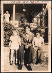 Lopez Family sitting on Porch, circa 1940s