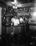 A Bartender at the Mientras Dure Bar