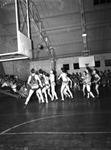 Basketball Game in a School Gym by Robertson and Fresh