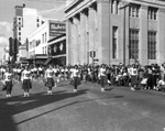 Cheerleaders Show Their Stuff During the Children's Gasparilla Parade down Franklin Street by Robertson and Fresh (Firm)