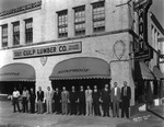 Employees pose in front of the Culp Lumber Company by Robertson and Fresh