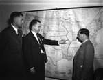 Educators at the University of Tampa Examining a Map by Robertson and Fresh