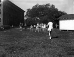 Female Students at the University of Tampa Practicing Softball